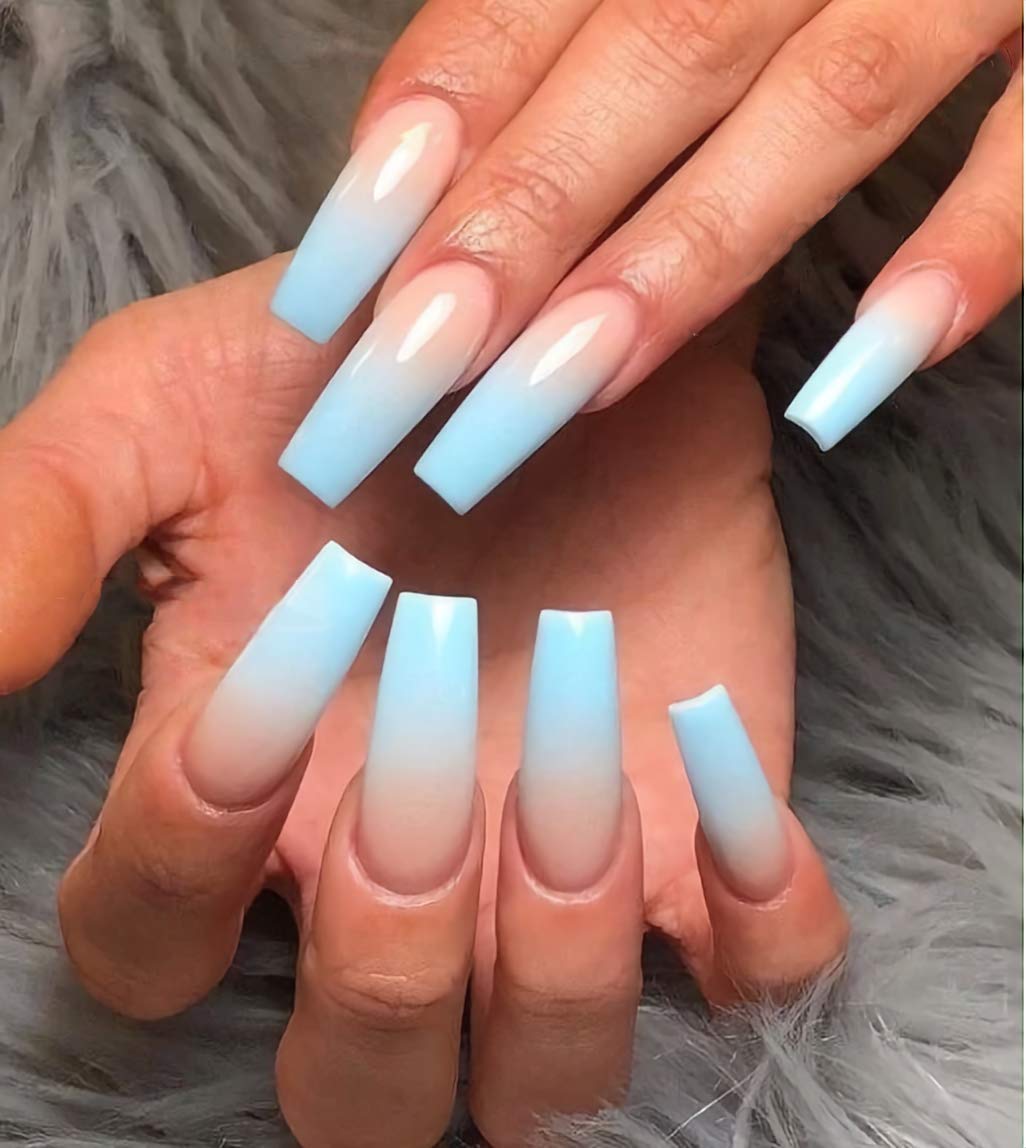 fingers wearing blue ombre nails 70305100