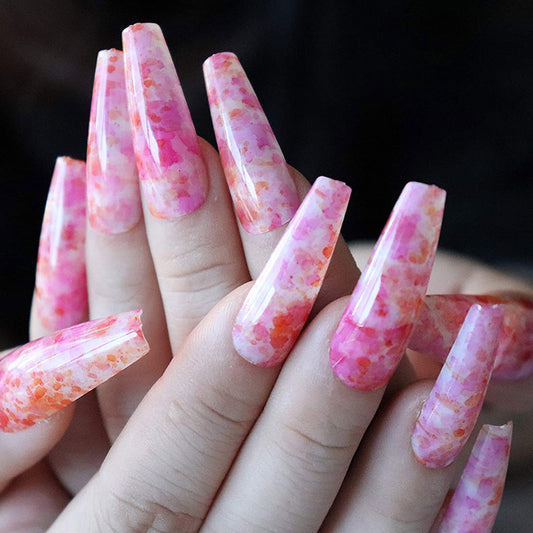 model's fingers wearing ombre acrylic nails