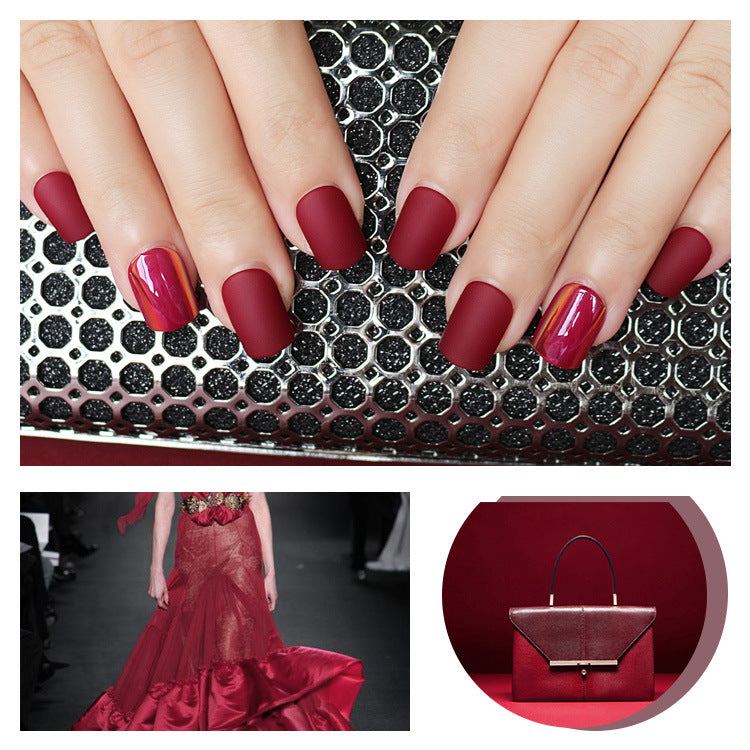 model wearing red nails