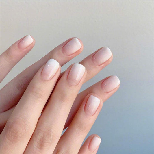 model's fingers wearing white ombre nails 70306900